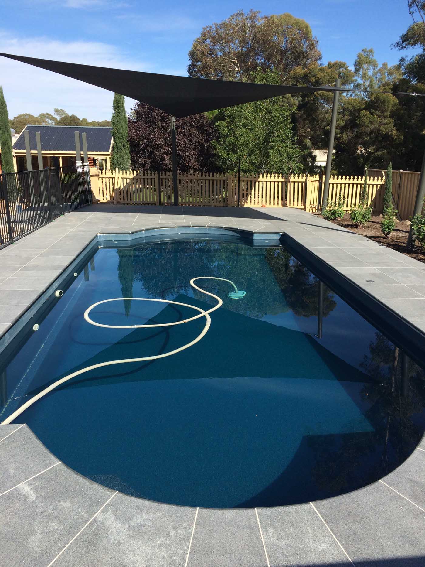 Retaining wall built for a sloping and difficult block in Bendigo with professional landscape construction.